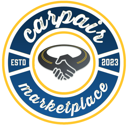 The picture is of a circular logo. The outermost border of the circle is yellow. Inside it, there is a blue ring with two sections. The top section has the word "Carpair" in white cursive letters and the bottom section has the word "Marketplace" in similar white cursive letters. Within the blue ring, there are two white blocks that read "ESTD" on the left and "2023" on the right. At the center of the logo, there is a stylized graphic of two hands shaking. The hands are black with yellow and white outlines. The background behind the hands is white with a black border. The overall design gives the impression of a marketplace that was established in 2023.