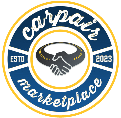 The picture is of a circular logo. The outermost border of the circle is yellow. Inside it, there is a blue ring with two sections. The top section has the word "Carpair" in white cursive letters and the bottom section has the word "Marketplace" in similar white cursive letters. Within the blue ring, there are two white blocks that read "ESTD" on the left and "2023" on the right. At the center of the logo, there is a stylized graphic of two hands shaking. The hands are black with yellow and white outlines. The background behind the hands is white with a black border. The overall design gives the impression of a marketplace that was established in 2023.